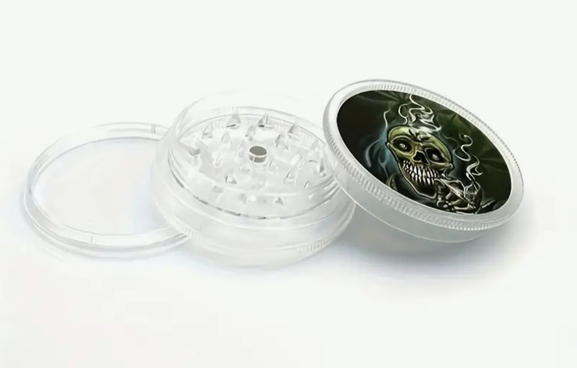 GRINDER A HERBE PLASTIQUE TRANSPARENT DIAM 6CM (3 PARTIES)